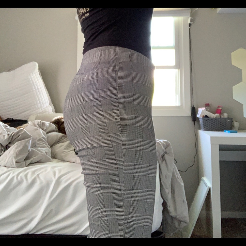 Plaid pants that are form fitting.